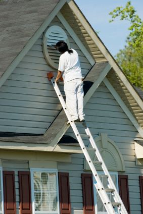 Exterior Painting being performed by an experienced Complete Painting Services painter.